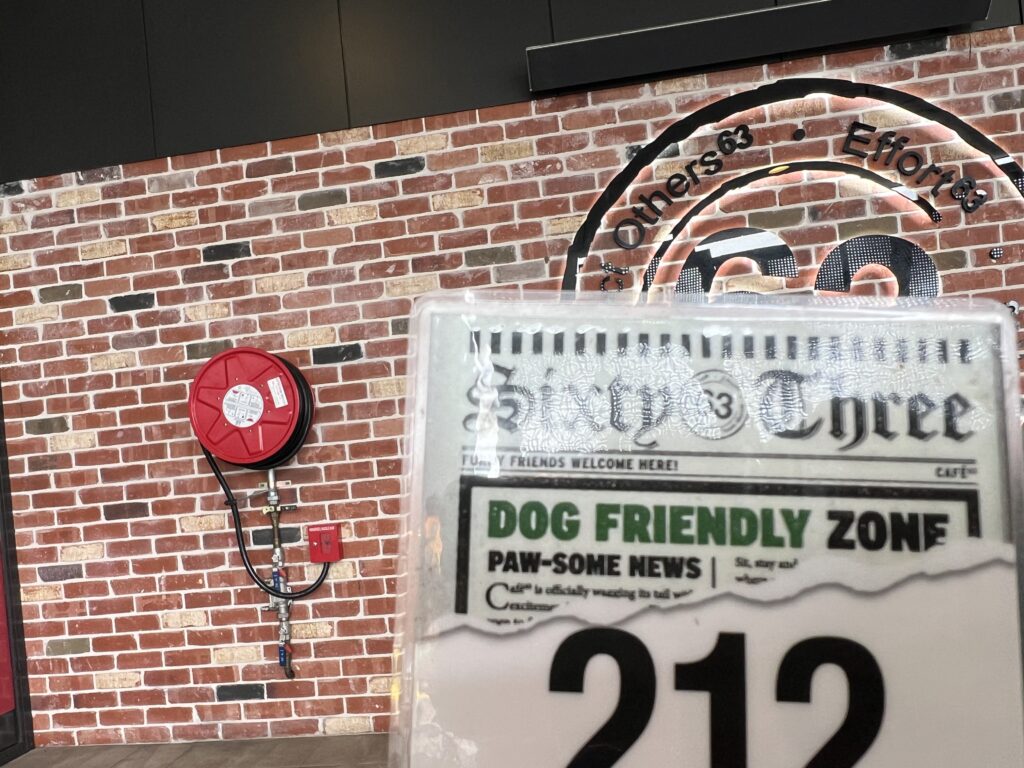 Ruff Ruff Reviews - Dog-Friendly Cafe - Cafe 63, Burpengary, Dog Friendly zone, fire hydrant, brick wall