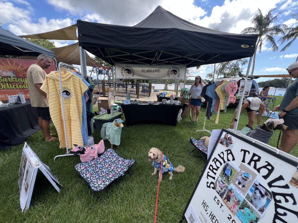 Ruff Ruff Reviews - A Dog's Life 2025 Expo, Noosaville, Ralph sitting in front of stores